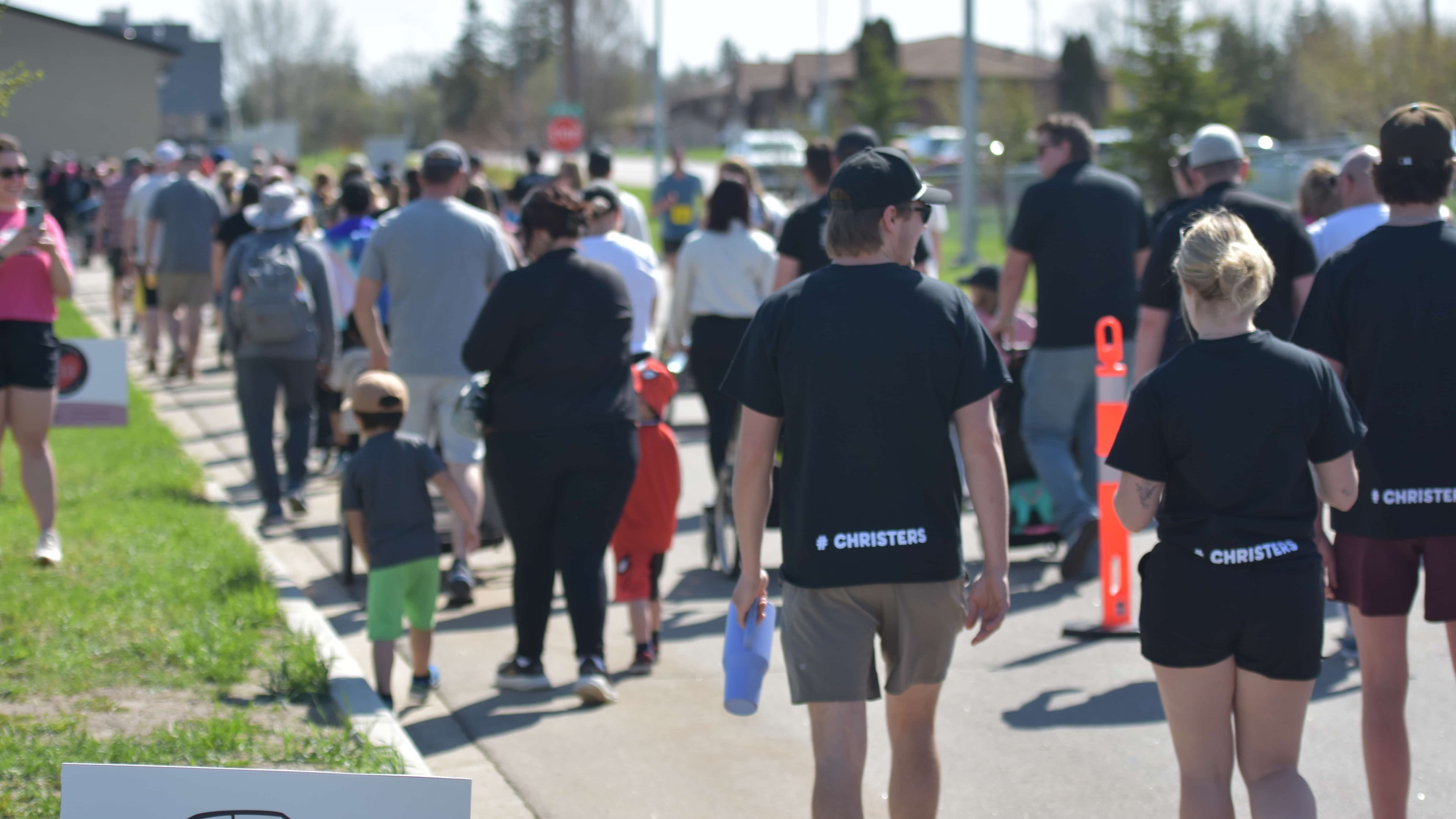 Hundreds of people embark on the 2km family walk during the 2026 Run for Rose fundraiser.