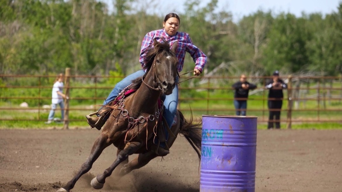 21-year-old Brooke Cameron barrel racing in a local rodeo.