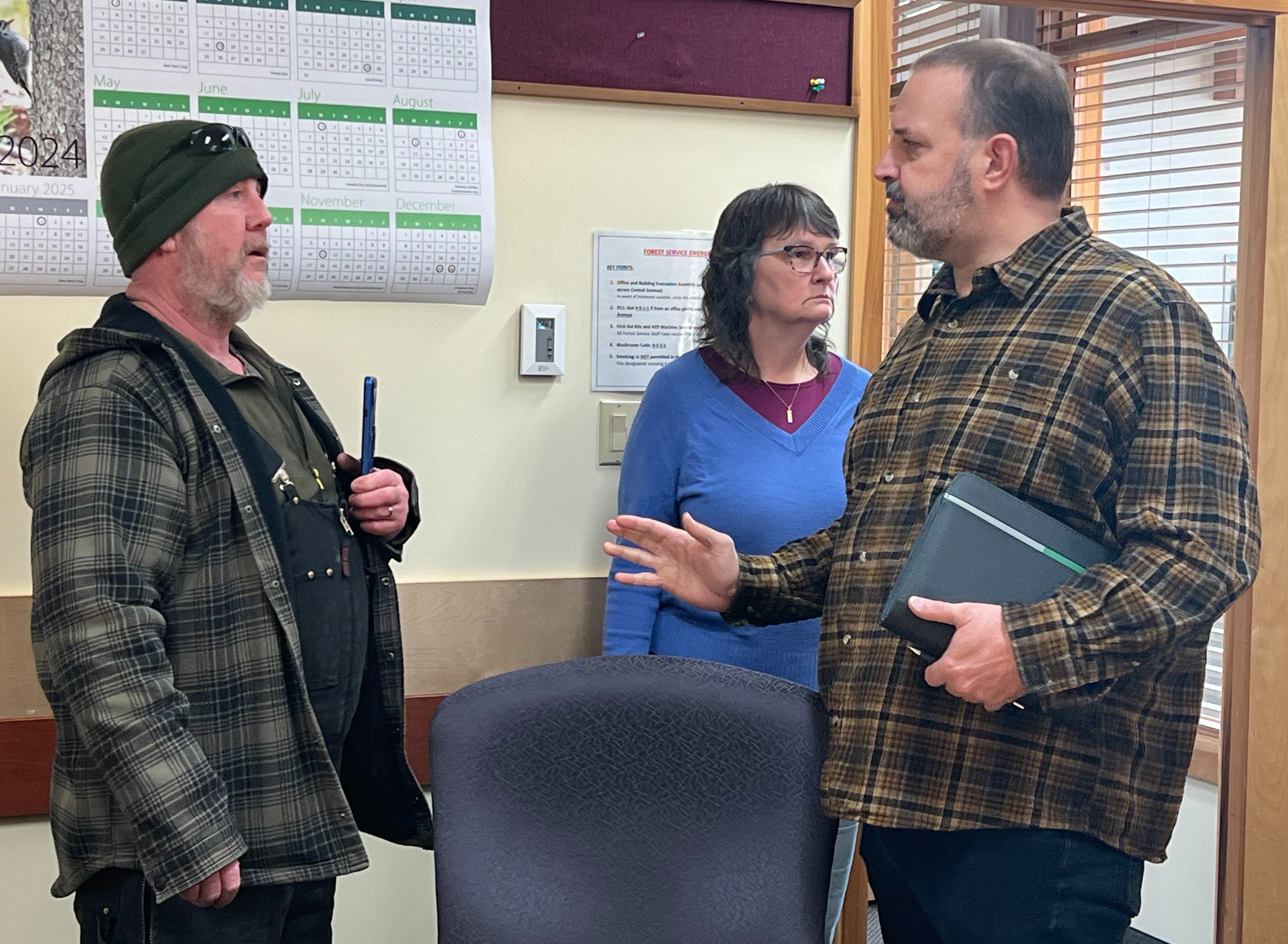 Dave Rondeau (left) speaks with Chris Brown during their meeting on January 13, 2024.
