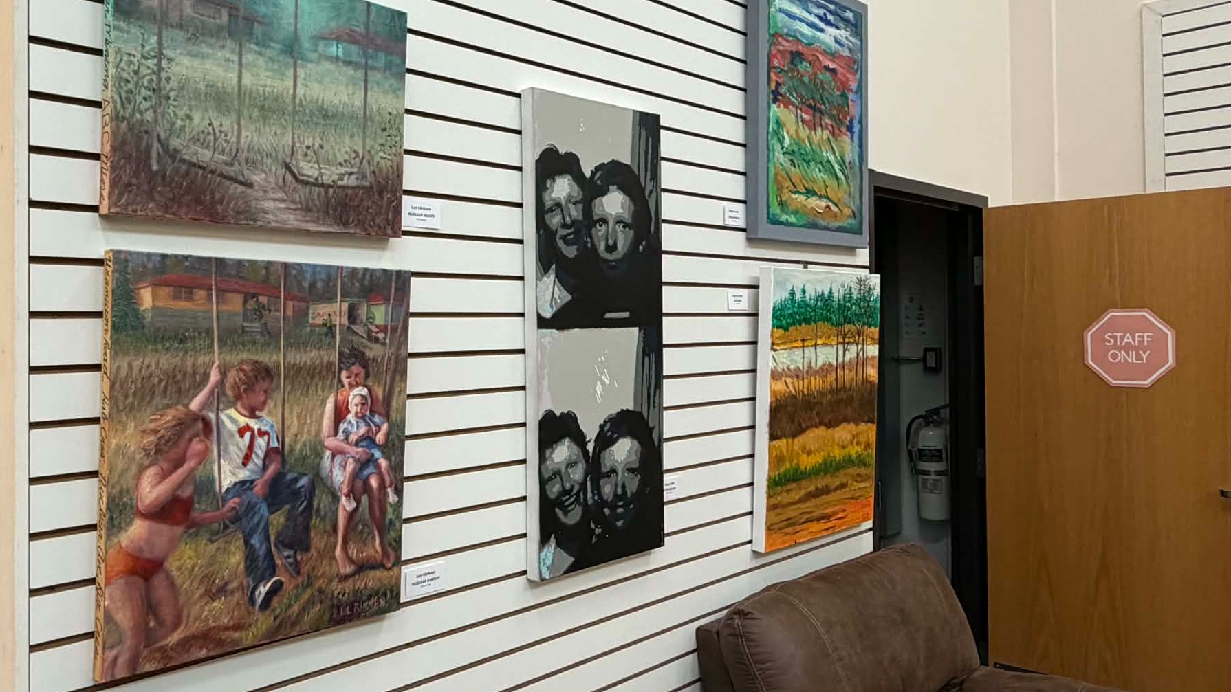 Greg Lobb's spray paint work on display at the library.