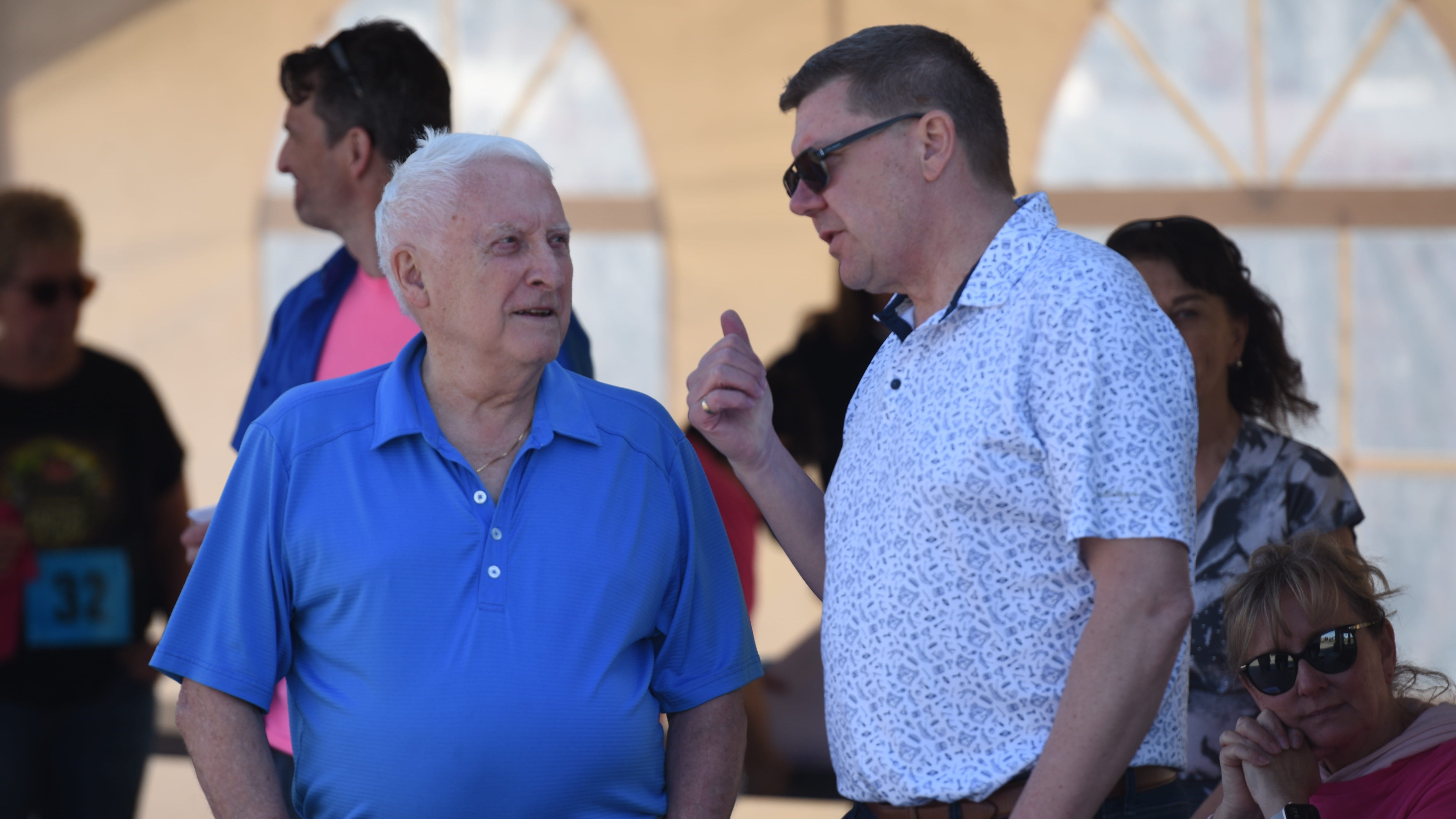 Community figure Malcolm Jenkins (left) shares a few thoughts with Premier Scott Moe during the opening remarks for the 2026 Run for Rose.