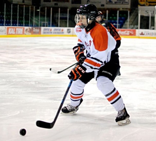 Hobson skates with the puck during her time as an assistant captain with the Northern Bears. She also captained the Northeastern University Huskies in Boston from 2020 to 2022 prior to going pro.