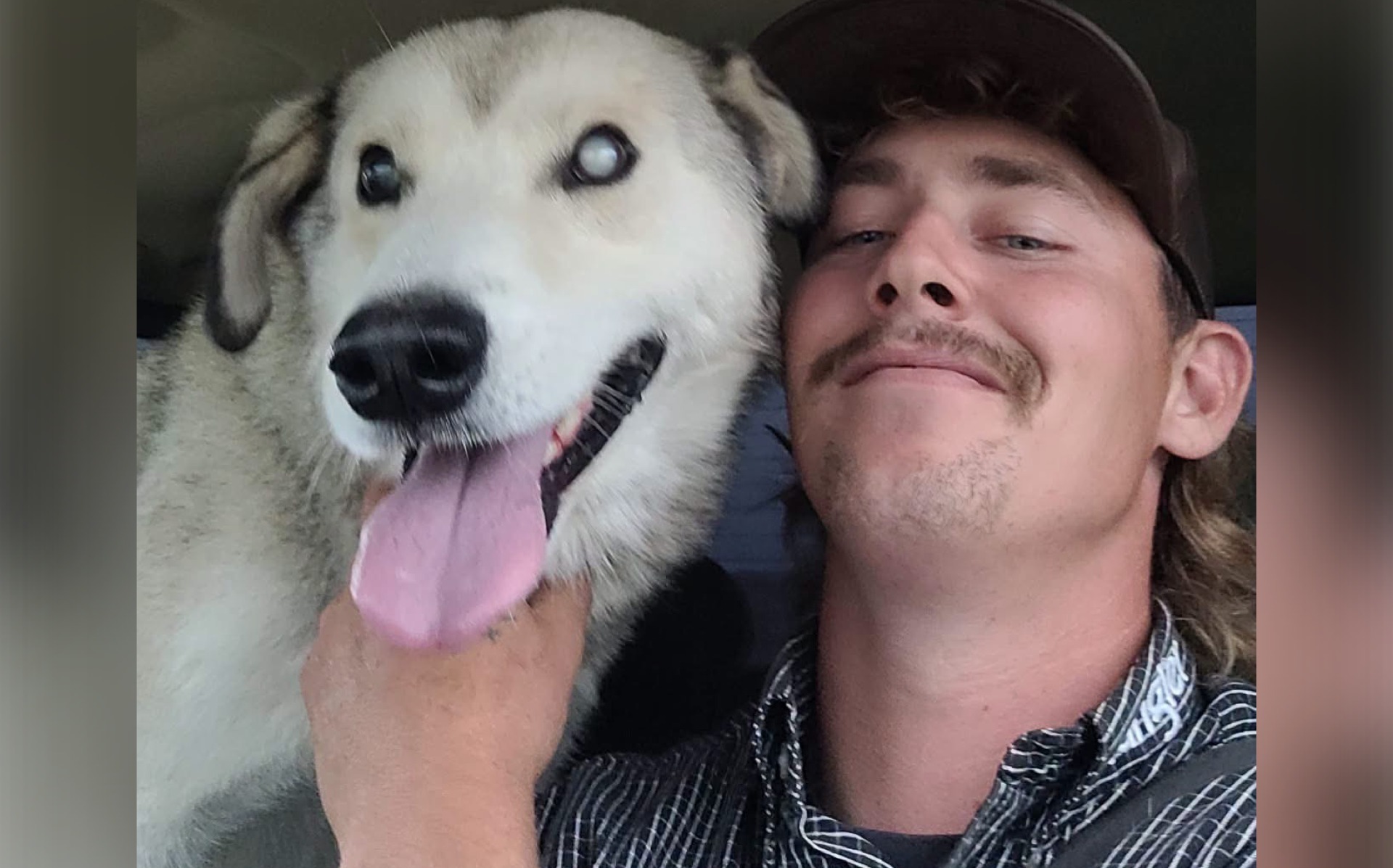 Blind dog Tobias rides in Cody Lambert’s truck during the nearly two-hour trip from Big River First Nation to Meadow Lake on Aug. 30, 2026. Lambert volunteered to transport Tobias before deciding during the journey to adopt him.