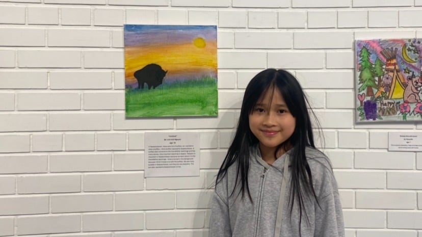Linh Anh Nguyen with her water color painting.
