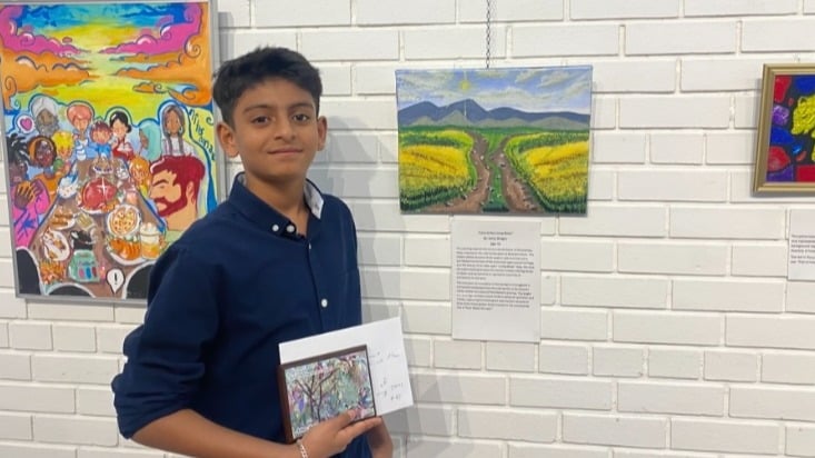 Asher Shagan with his painting.