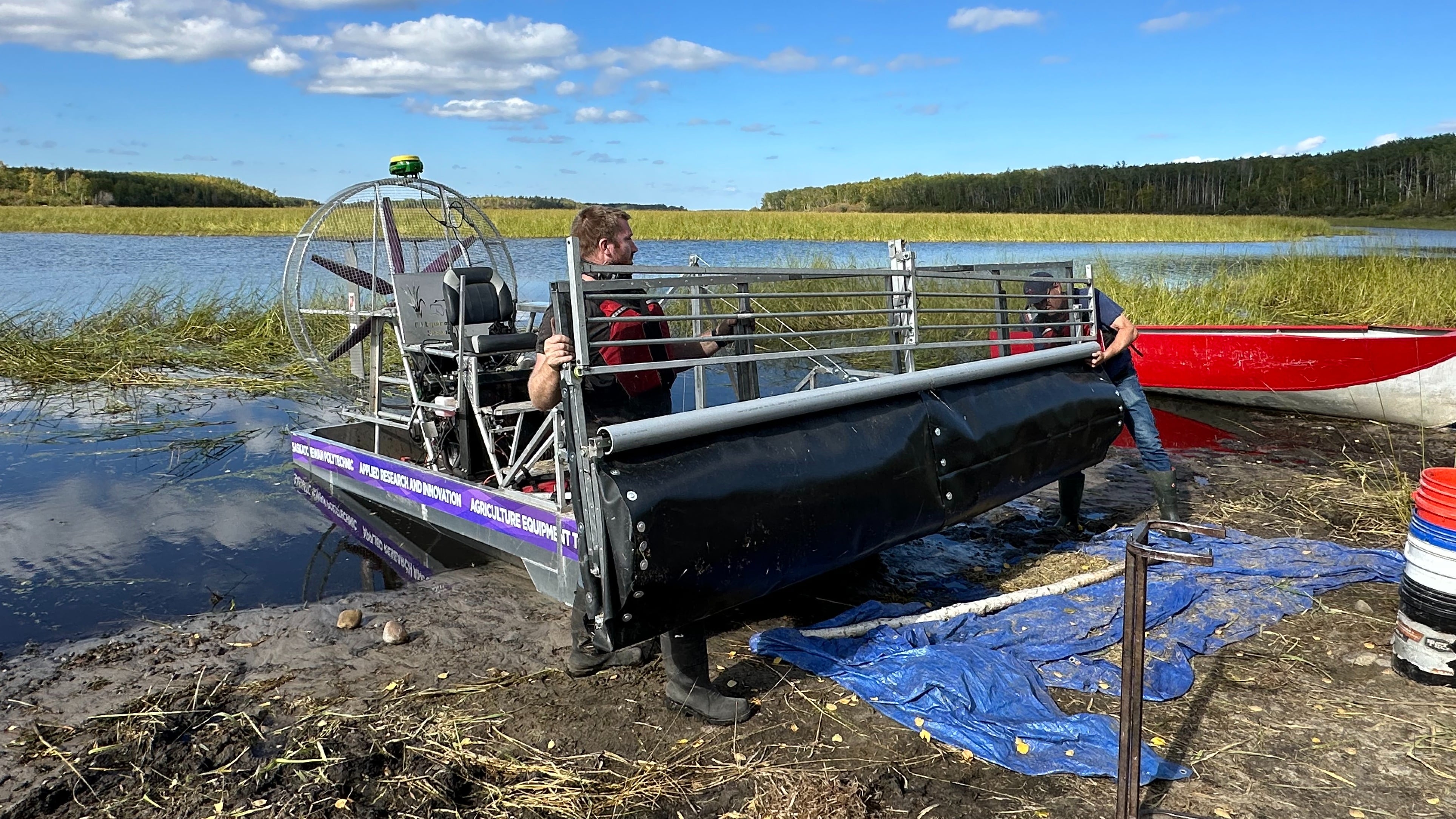 The hopper, also known as catch basin, is also wider on the protype boats. This one is capable of folding together.