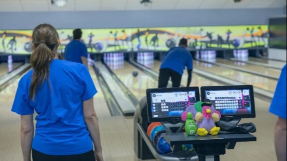 Mitchell MacDonald bowls alongside fellow Team Alberta athletes during a practice session at Panorama Lanes.
