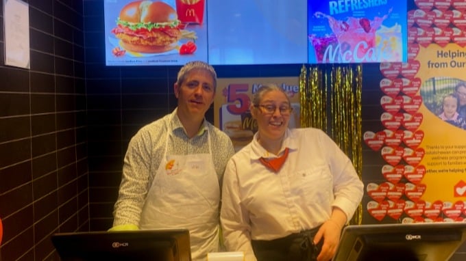 Volunteers helping work in North Battleford's McDonald's on McHappy Day.