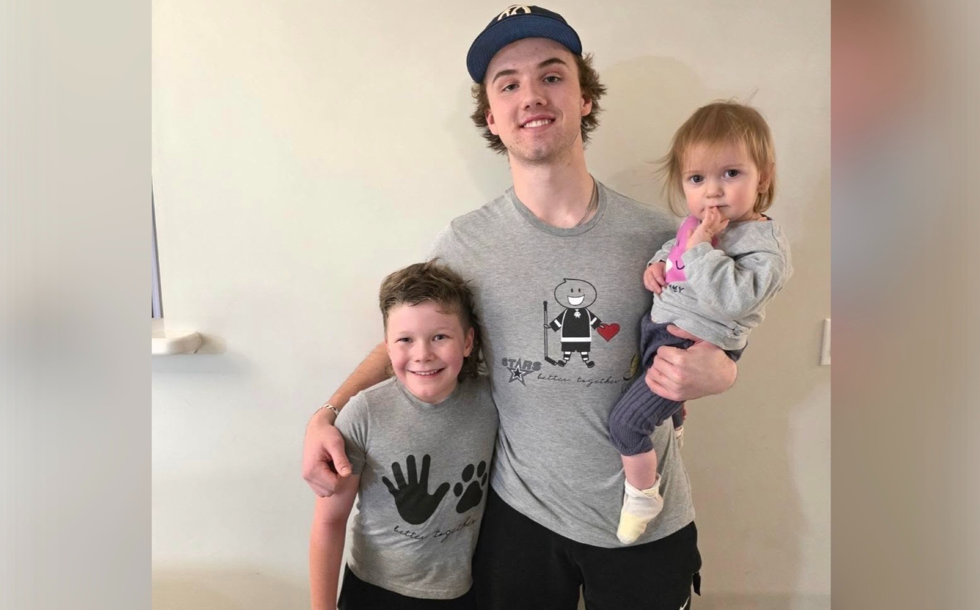 Battlefords North Stars forward Finlay Klippenstein poses with Benjamin Nelson (left) and Miley Nelson at the family’s home in North Battleford.