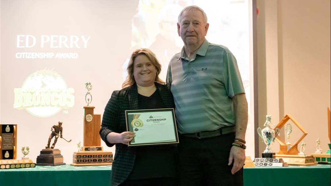 Perry accepts his Humboldt Broncos Citizenship Award in 2025.