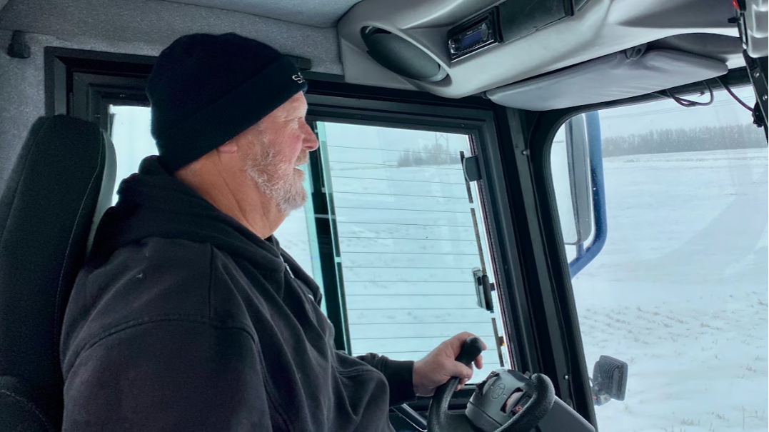 Kevin operating the trail groomer.