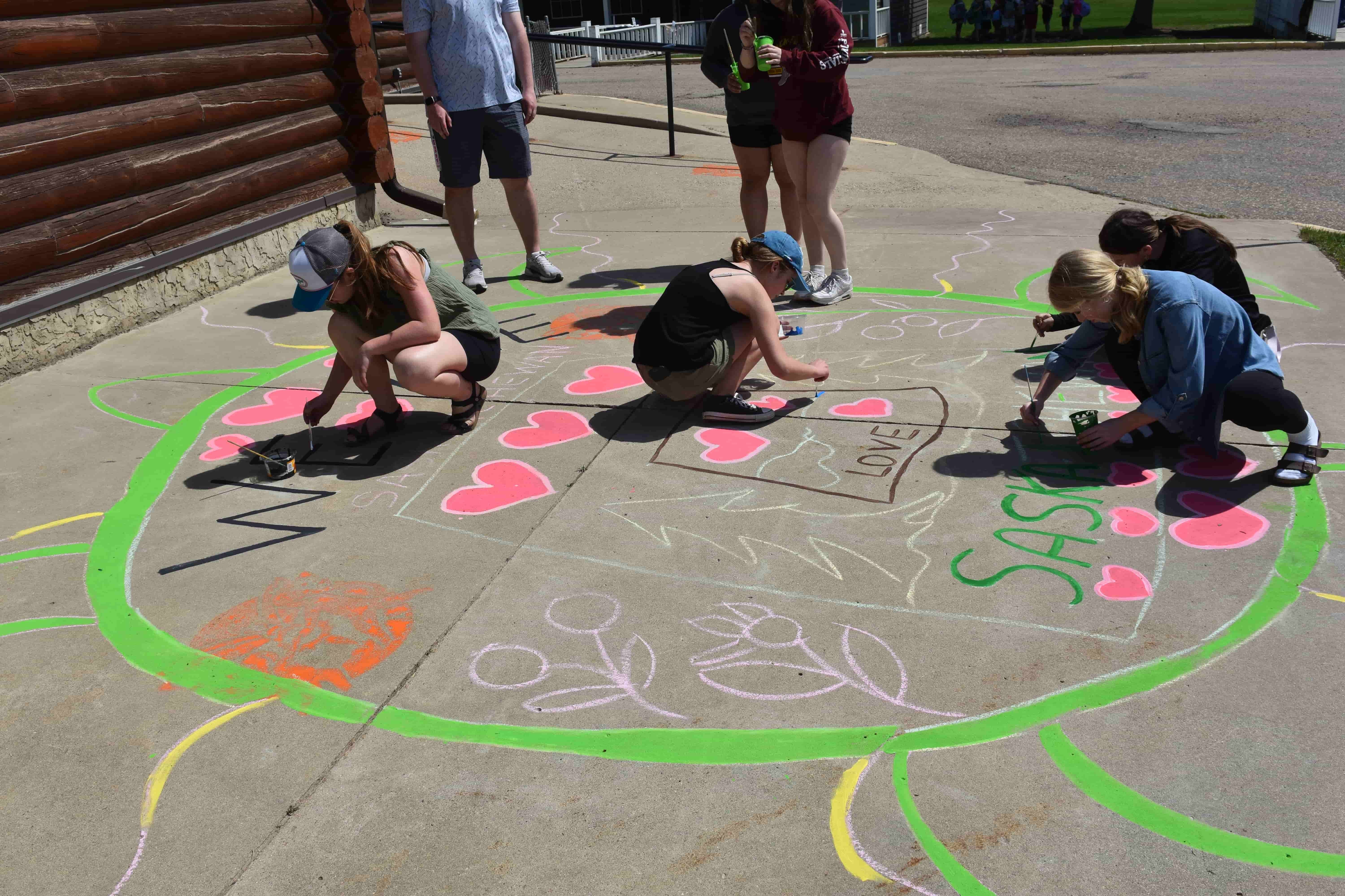 Painting Leah Dorion's latest piece was all hands on deck kind of job.