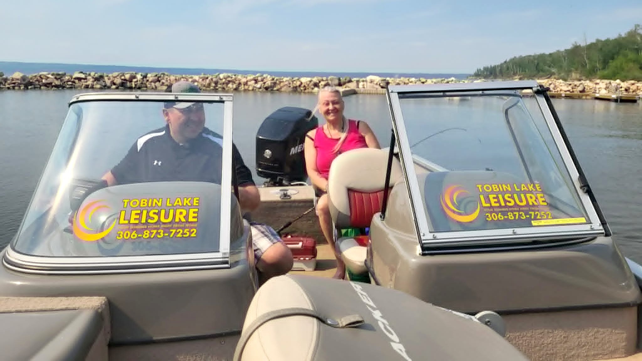 Town of Nipawin Manager of Community Services, Derek Seckinger and media alumnus Laurie Kratochvil at the end of a successful day of fishing.