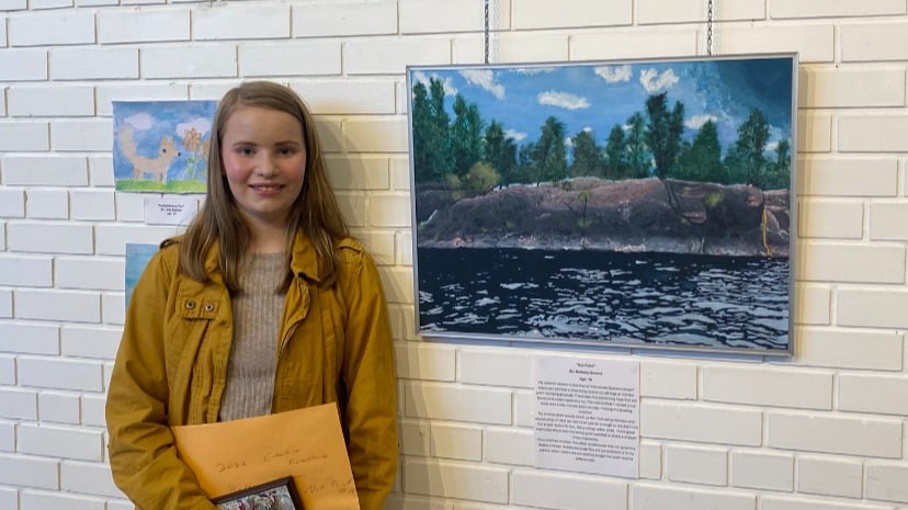 Bethany Kokura with her painting.