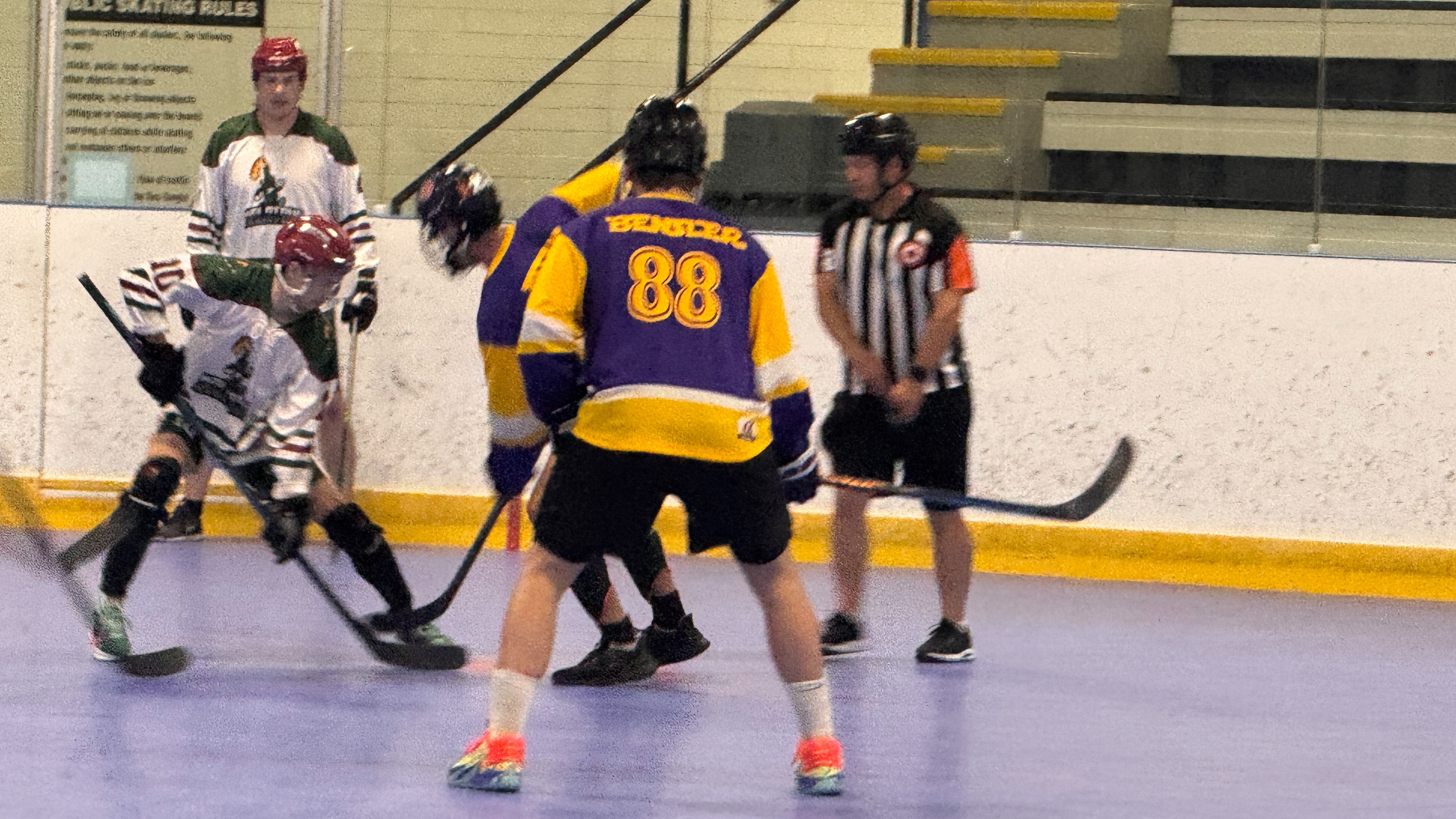 Wass drops the ball while Allan takes a draw during a Hat Ball Hockey League game. Both will be in Slovakia at the world ball hockey championships.