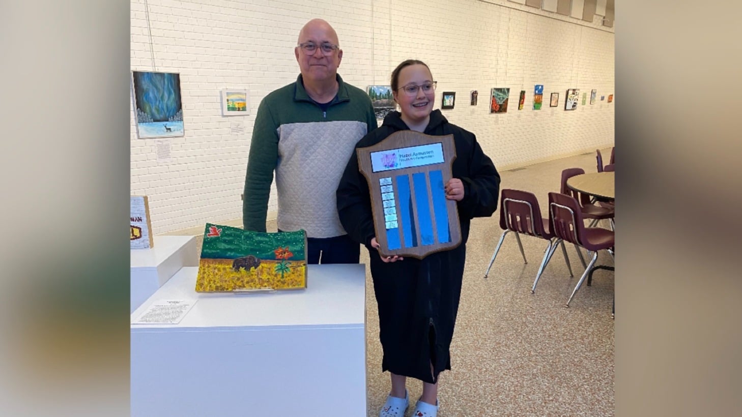 Jolie Malo with her 2026 Hazee Youth Art Award.