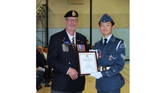 Sergeant Alex Kim with President Daniel Sigouin, Legion Branch 70, North
Battleford.