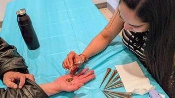 Henna artist at work.