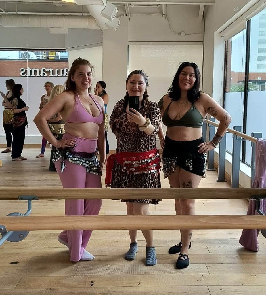 The three ladies pose for a photo during the workshop.