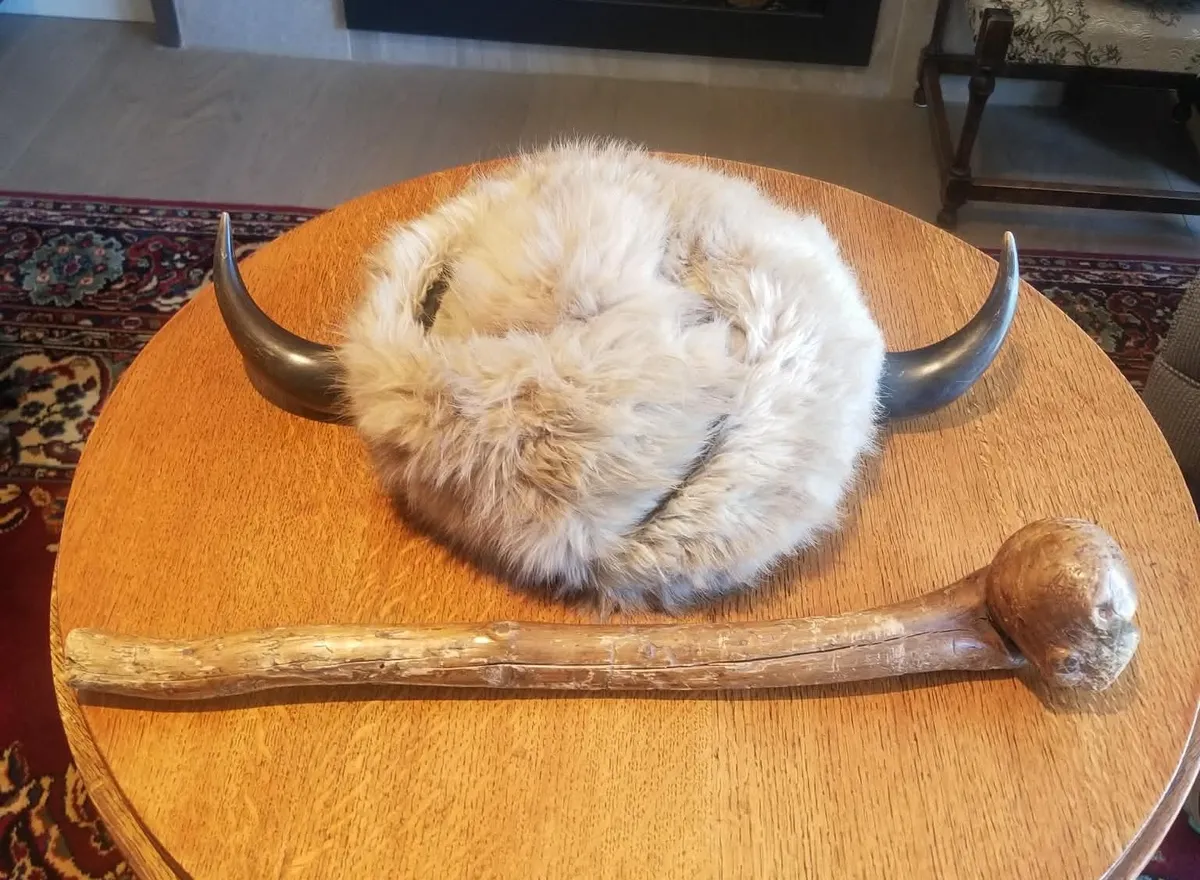 A buffalo horn headdress and a wooden club - historical artifacts recently returned to the Poundmaker Museum and Gallery.