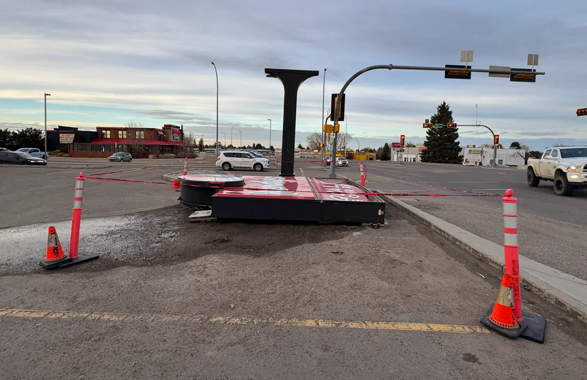 The sign from Wendy's near the Medicine Hat Mall placed on a parking stall Thursday evening.