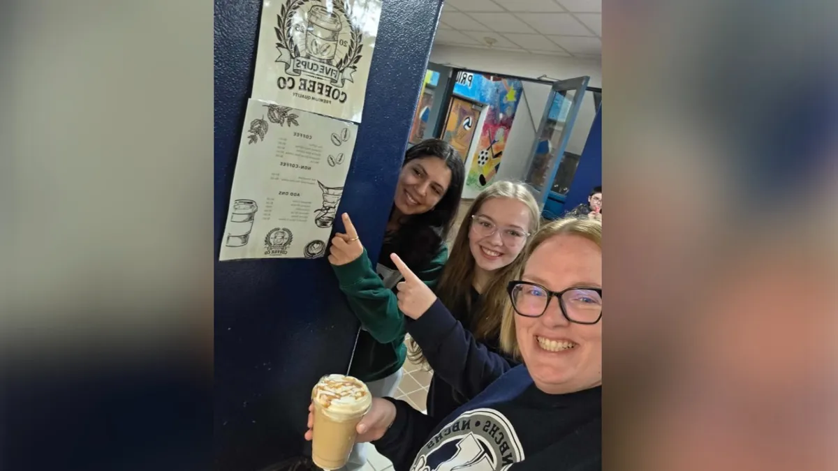 Students and entrepreneurship teacher, Rhonda MacDonald enjoying Five Cups Coffee Co.