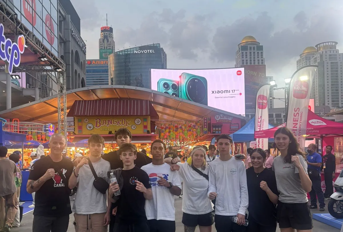 Team Canada members, including (l to r) head coach Brad Ross, Sunny Meredith, Misha Polishchuk, Memphis McIntosh (front), Jayden Willis, coach Andrienne Parent, Jatgen Willis, Mehreen Khakh and Havanna Demers, pose for a picture in Bangkok, Thailand.