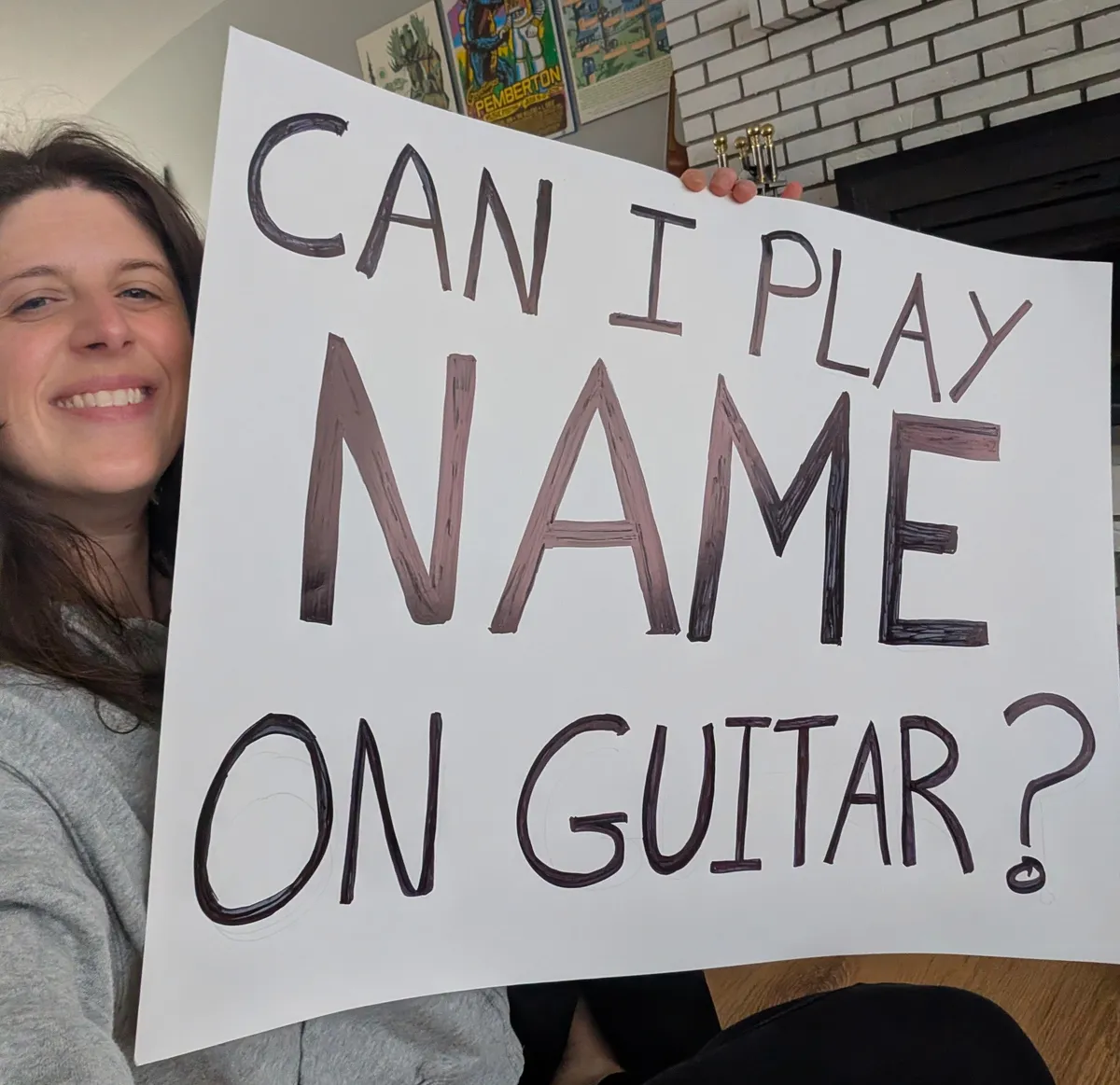 Hackett waited to bring out her signs until the moment the Goo Goo Dolls were about to perform 'Name', her song of choice.