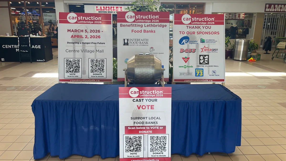 The Canstruction booth at Centre Village Mall.