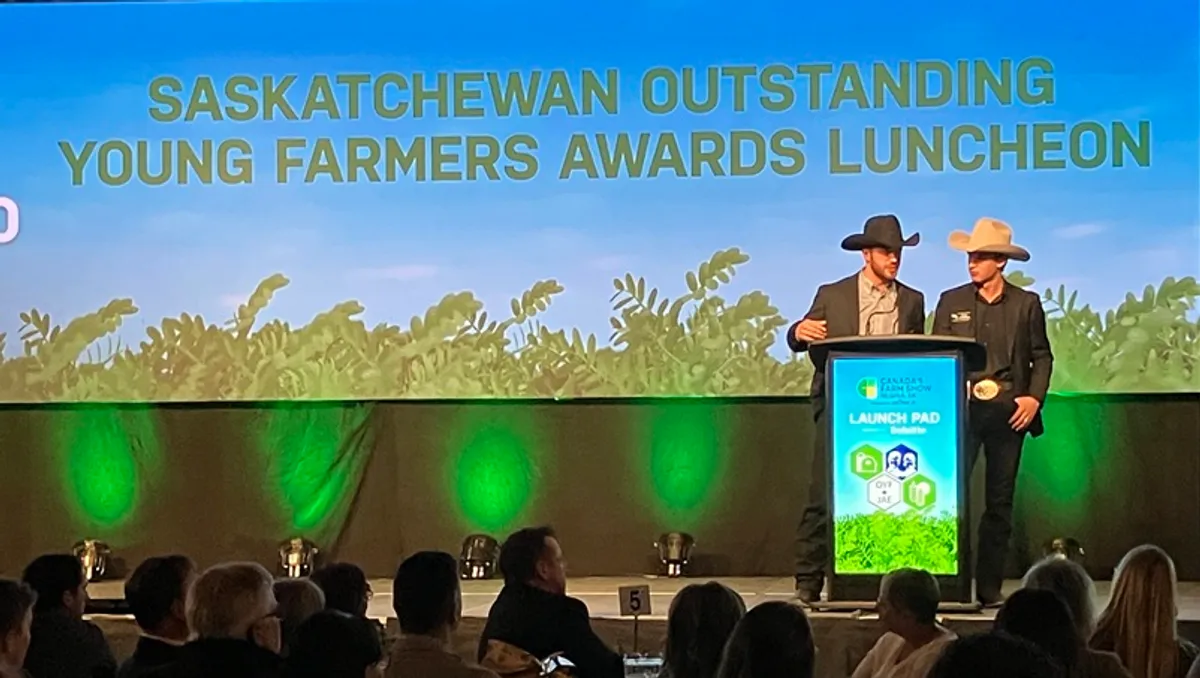 Brothers Beau and Cashe Stevenson talk about their livestock operation at the Saskatchewan's Outstanding Young Farmer luncheon during Canada's Farm Show in Regina, Sask. Hi-Lite Feedlot is located west of Melfort.