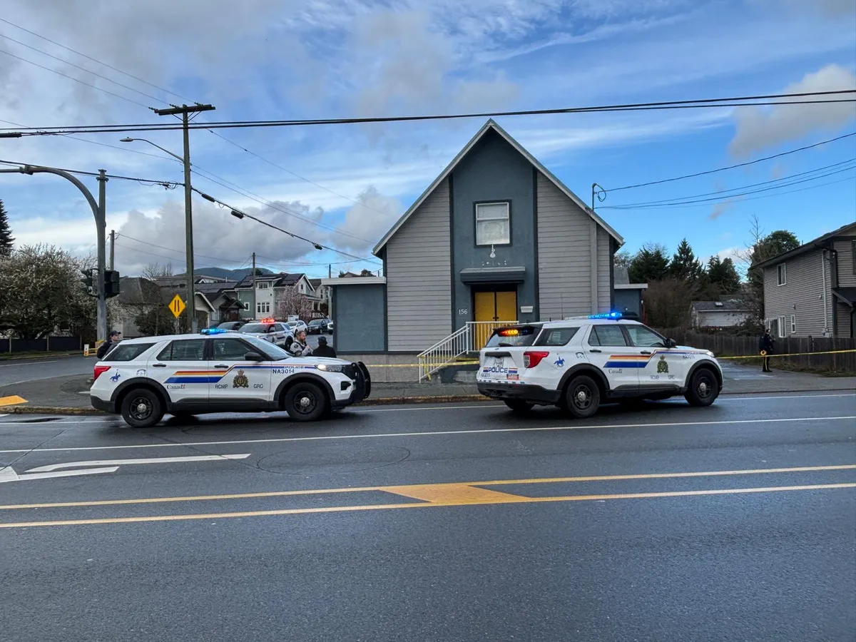 Police stage outside the property on Friday morning, investigating a stabbing outside a local yoga studio.