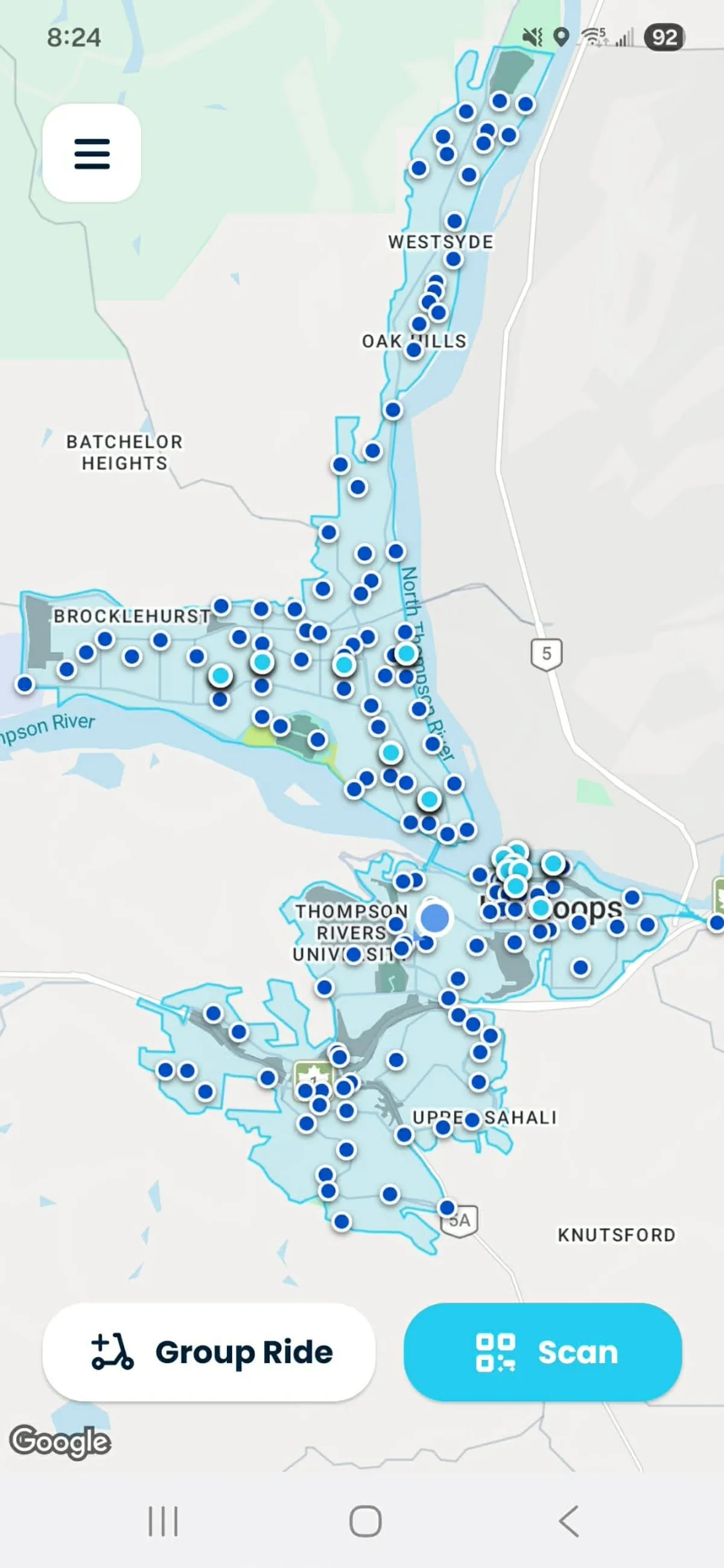 Dark blue dots represent designated parking spaces within the Bird Canada app while light blue dots represent available e-bikes and e-scooters.