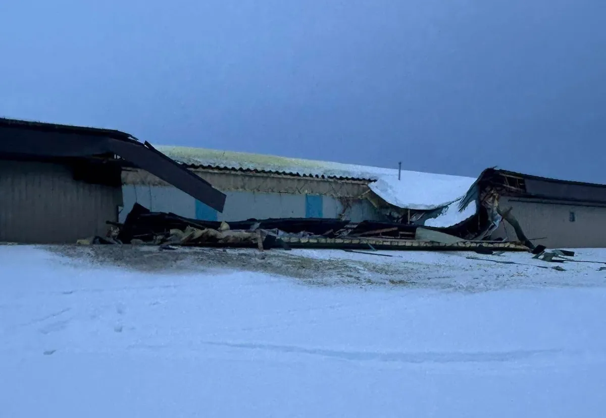 Damage is seen at the Goodsoil Curling Rink after a partial roof collapse.